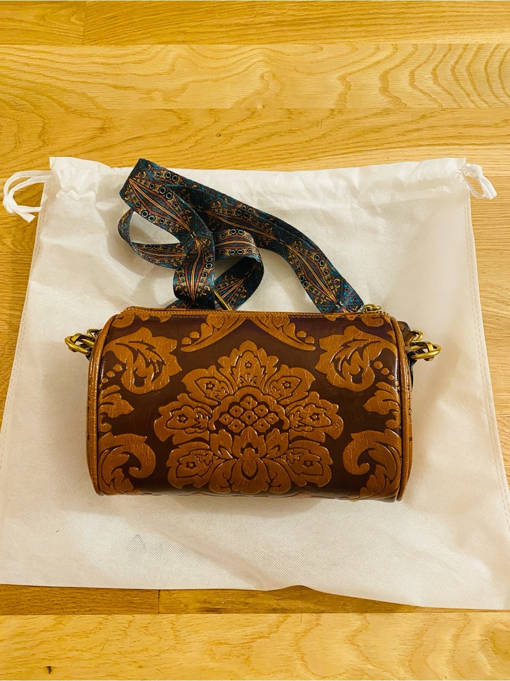 Classic Brown Floral Embossed Crossbody with Patterned Strap